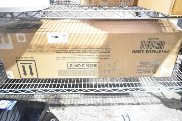 Total Tactic FP10788US-22WH Split Type Room Air Conditioner in original box, showing label and markings.