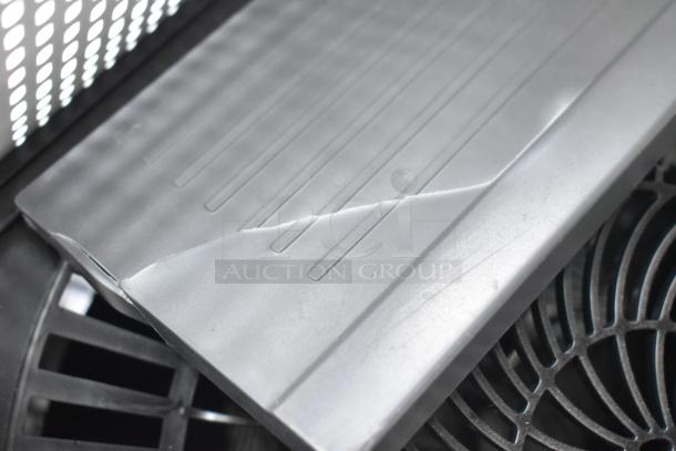 Two various fans, one Midea. Visible damage on fan cover. Auction doubles your bid.