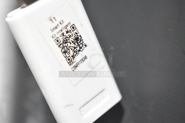 Two fans including a Midea model, featured in good condition. QR code indicates MAC: C084FF18046 for identification.