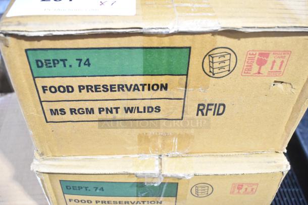 Box labeled "Dept. 74 Food Preservation" with RFID tags, slightly dented. Auction item: 7 brand new scratch and dent boxes.