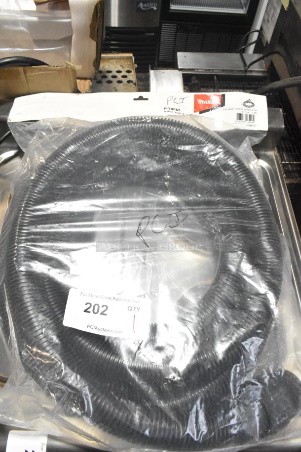 BRAND NEW Makita P-79865 Anti-Static Hose, 32mm x 5m, sealed packaging, minor scratches. Marked with product code and barcode.