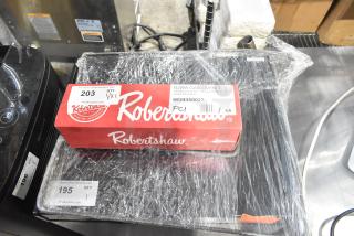 Brand new Robertshaw 4350-027 gas oven thermostat kit and Cooking Performance Group heating element, both in original packaging.