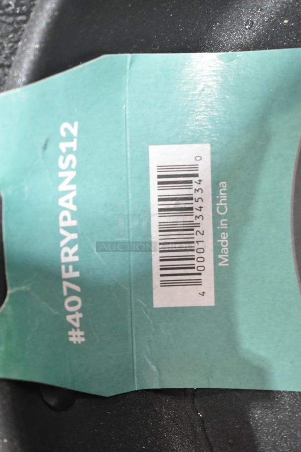 Label on a fry pan reads "#407FRYPANS12," barcode, and "Made in China." Black non-stick surface.