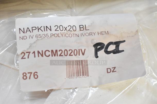 Ivory cloth napkins, 65/35 polycotton blend, 20"x20", pack of 12. Label shows item code 271NCM2020IV.