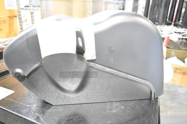 BRAND NEW Bio-Kleen Poly Wall Mount Paper Towel Dispenser, black, scratch and dent condition, with visible side latch.