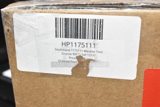 Alt text: Cardboard box with label showing "HP1175111 Southbend 1175111 Window Pack." Bar code and minor box wear visible.