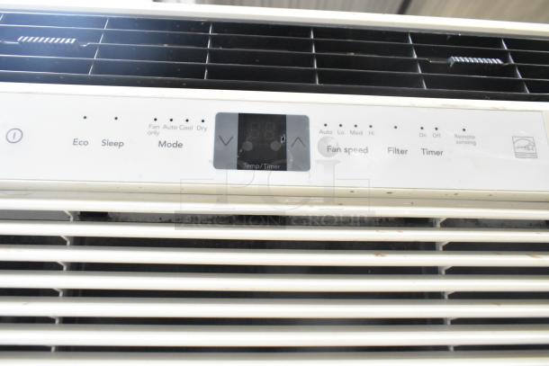 Two window mount air conditioners, models from LG and Frigidaire. Features eco, sleep modes, and remote sensing. Good condition.