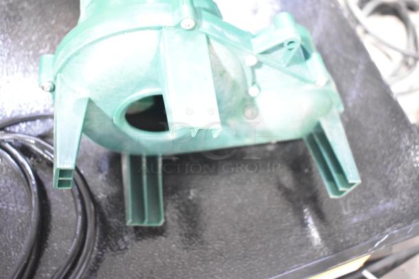 Brand new Zoeller 212-0001 M212 sewage pump, 115V, visible casing scratch, black cord included.