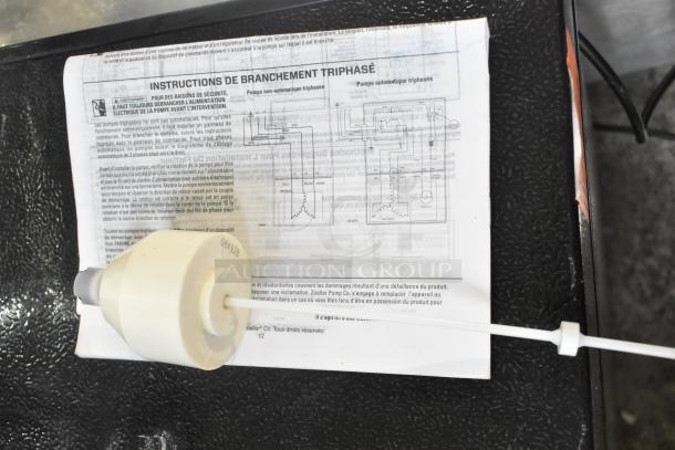 BRAND NEW Zoeller 212-0001 M212 Sewage Pump, 115V, slight cosmetic damage, includes wiring instructions.