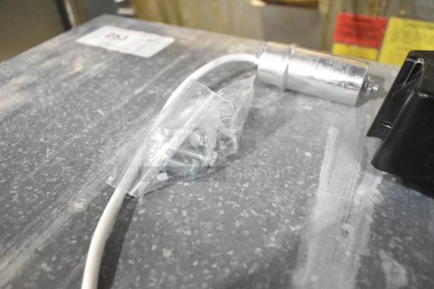 BRAND NEW Cubigel NUT70NR Avantco compressor with minor scratches for various series. Includes wiring and mounting hardware.