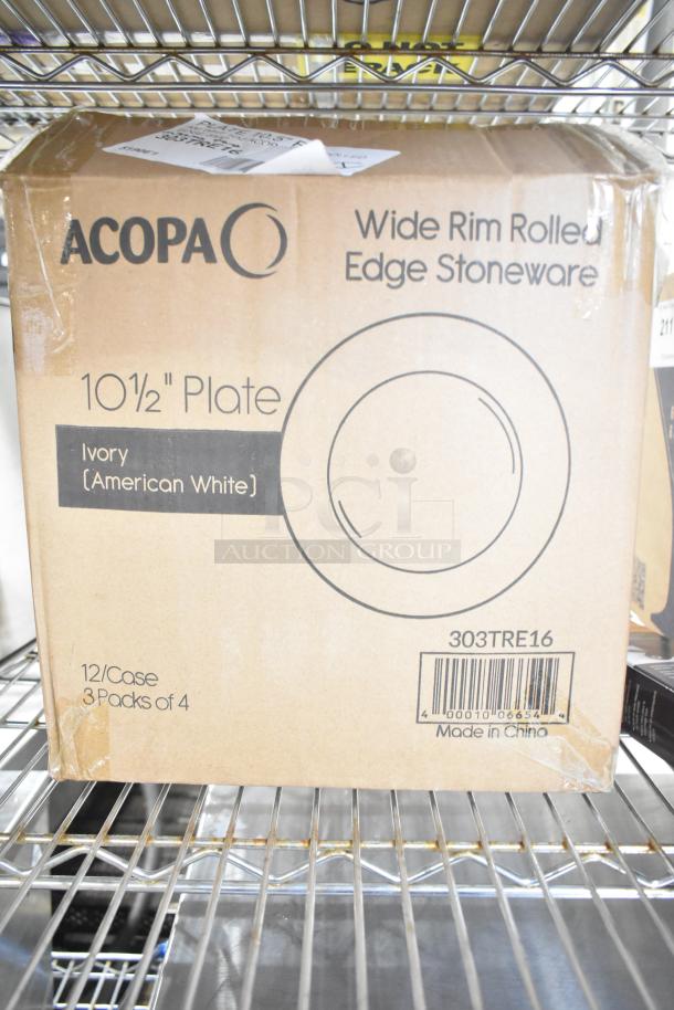 Box of Acopa 10 1/2" ivory stoneware plates, 12 per case. Wide rim, rolled edge. Model 303TRE16, made in China.