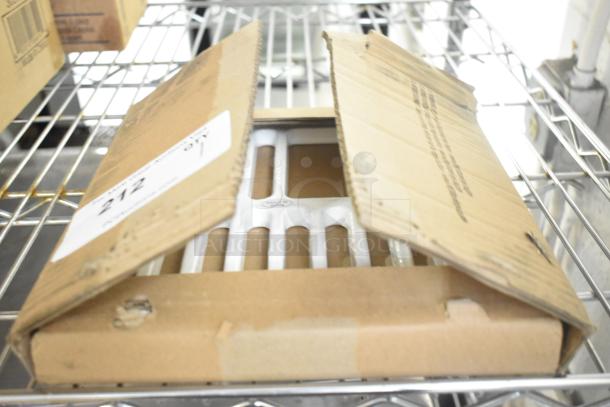 Brand new Zurn Elkay JP2376-T cast iron enameled grate in opened box, designed for FD2376 floor sinks. Minor box wear.