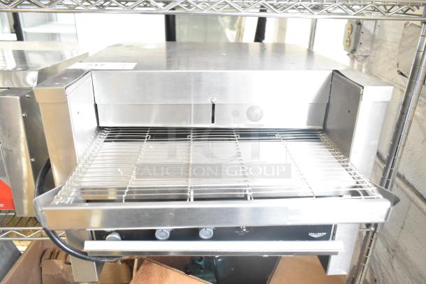 Brand new Vollrath JT2000 conveyor toaster, 1 1/2" opening, scratch and dent condition, 208V, 1 phase, shelf-mounted.