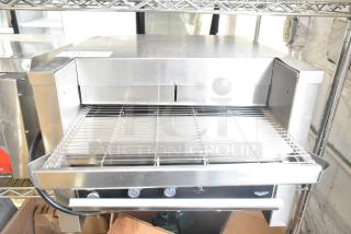 Brand new Vollrath JT2000 conveyor toaster, 1 1/2" opening, scratch and dent condition, 208V, 1 phase, shelf-mounted.