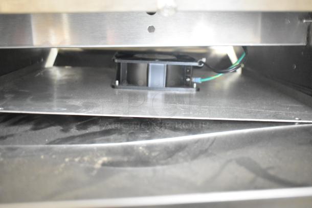 BRAND NEW SCRATCH AND DENT! Vollrath JT2000 Conveyor Toaster interior with visible fan, 208 volts, 1 phase, 1.5" opening.