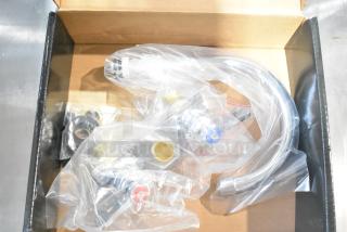 Vollrath JT2000 wall mount sink faucet in box, new, with 6" swivel gooseneck spout and 4" centers, in original packaging.