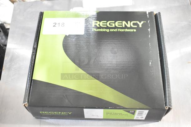 Brand new Regency 600FW46G wall mount sink faucet with 6" swivel gooseneck spout; box shows minor wear.