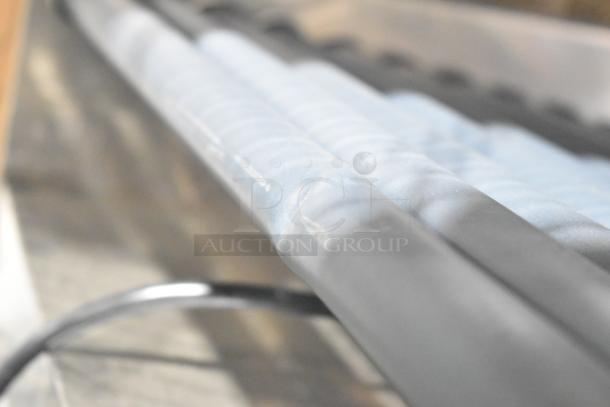 Nemco 8045SXW-SLT wide slanted hot dog roller grill, GripsIt coating, 45 hot dog capacity, 120V, scratch and dent condition.