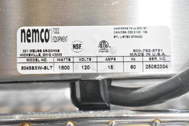 Wide slanted Nemco 8045SXW-SLT hot dog roller grill, 45-capacity, non-stick, 120V, model tag visible.