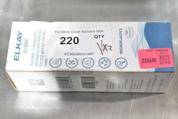 Box of Elkay 51300C WaterSentry Plus filter, new, marked as NSF certified, includes auction label and QR code.
