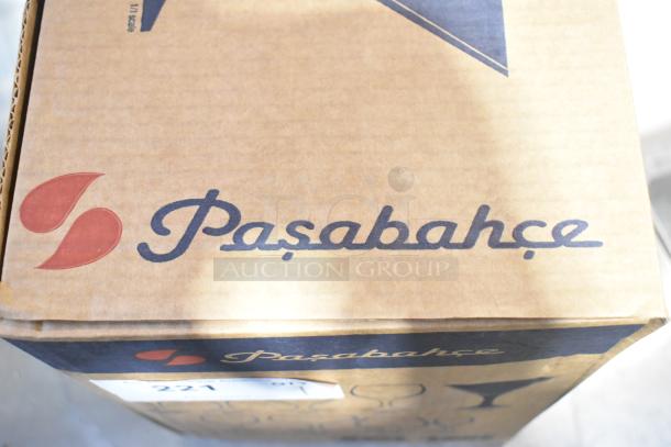 Box of Pasabahce 44410 Bistro Sodalime Glasses, brand new with scratch and dent; visible logo on cardboard packaging.