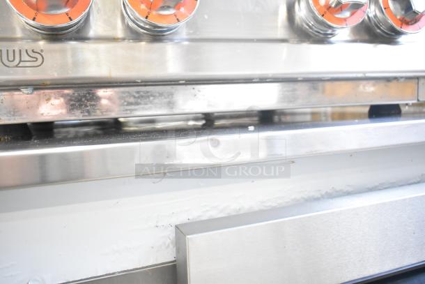 2023 Lotus PCT-66ET countertop electric 4-burner range, stainless steel, visible controls, suitable for commercial use.