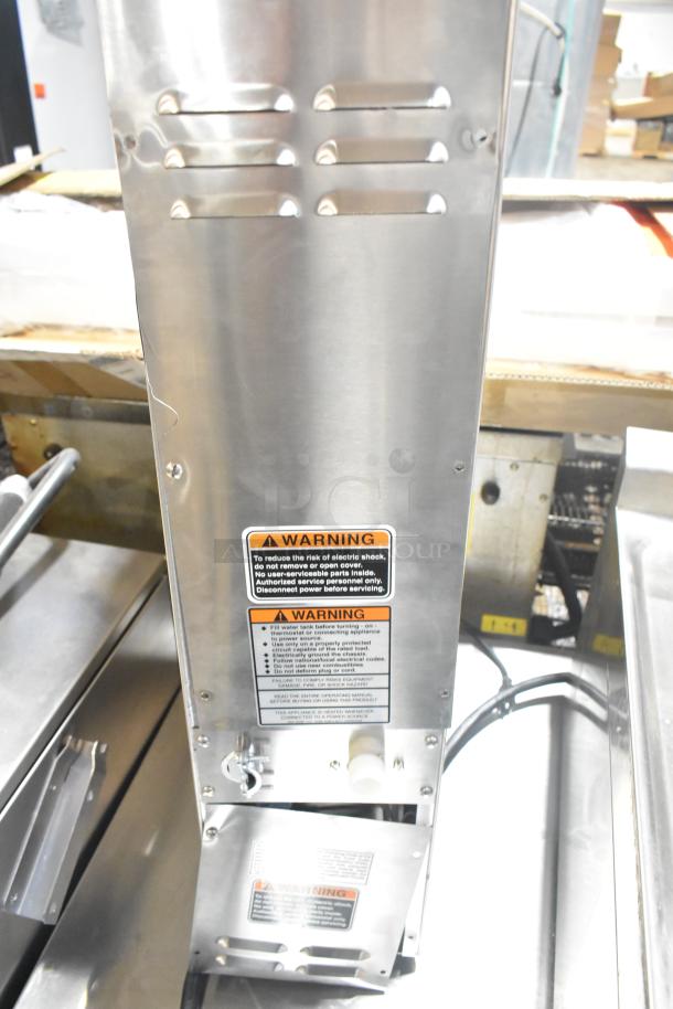 BRAND NEW Bunn H5X Commercial Hot Water Dispenser, 208V, 1 Phase, with visible warning labels and scratch/dent condition.