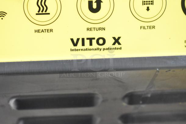 Vito XM mobile fryer oil filter system label, showing heating, return, and filter icons with "VITO X" trademark.