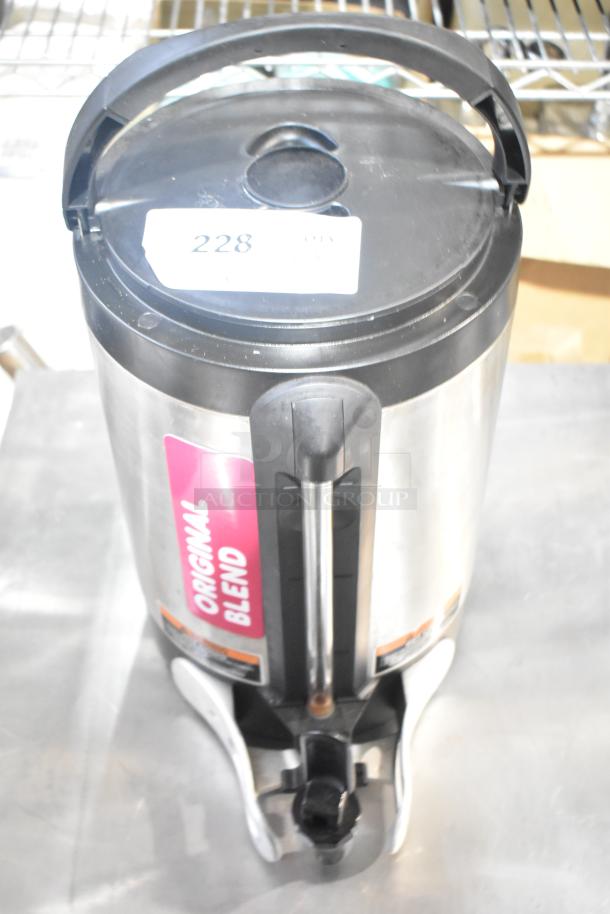 Hamilton Beach beverage dispenser with "Original Blend" label, stainless steel finish, black handle, and condition tag "228".