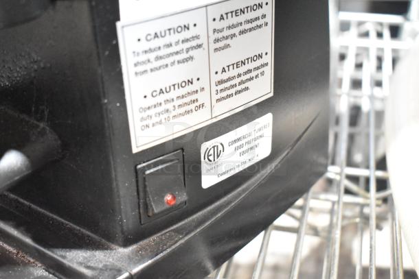 SM Commercial Countertop Espresso Bean Grinder, 115 Volts, 1 Phase. Caution label advises operational duty cycle. ETL-certified.