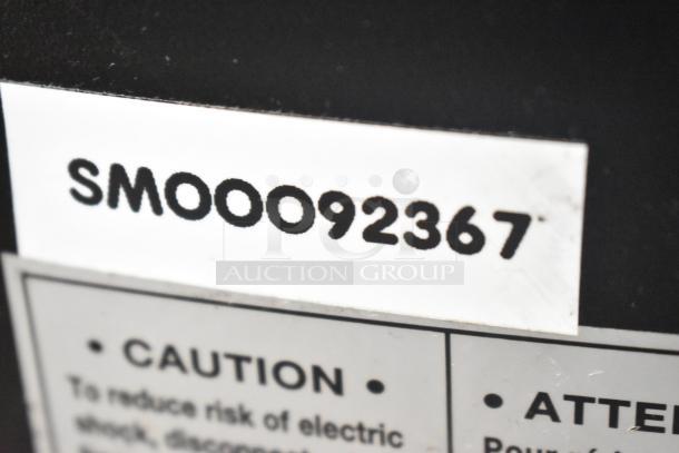 SM Commercial Countertop Espresso Bean Grinder, 115 Volts, 1 Phase. Serial number SM00092367, caution label visible.