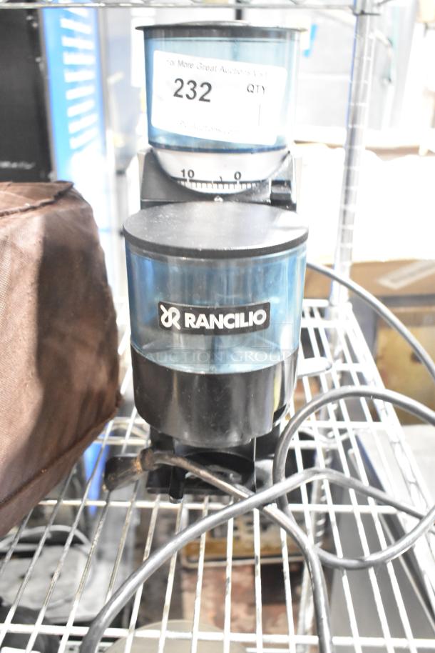 Rancilio Rocky Doser espresso bean grinder, 115 volts, 1 phase, blue chamber, visible label "232", fair condition.