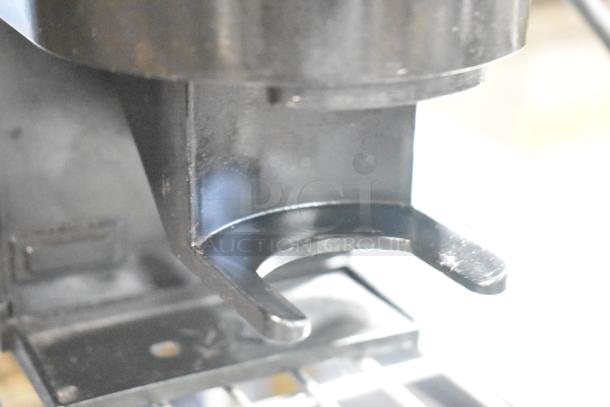 Rancilio Rocky Doser espresso bean grinder, black finish, 115 volts, good condition, features countertop design.