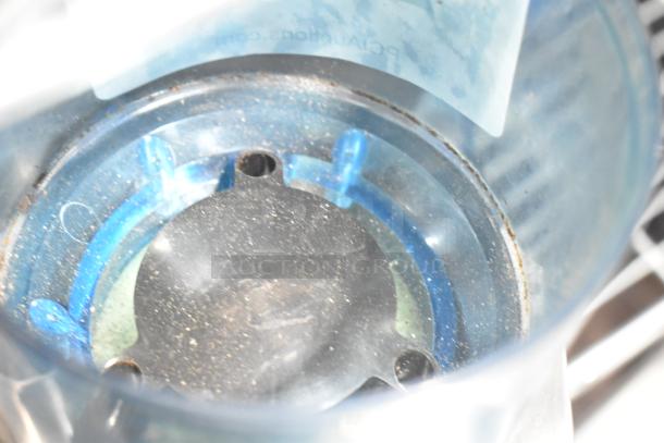 Rancilio Rocky Doser espresso bean grinder, 115V, 1 phase, showing inner dosing chamber with signs of use.