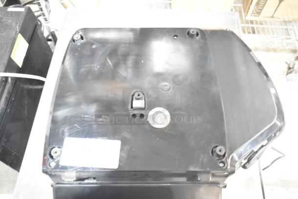 2024 Hobart HTi-7LH4W countertop scale, black surface, label visible. 120/208-240V, 1 phase. Appears in good condition.