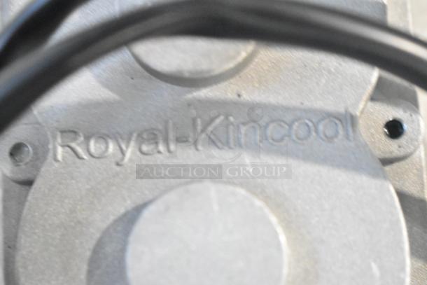 Royal Kincool FL57BLS01-24V-4000AD-01 round motor, metallic finish, embossed brand logo visible.