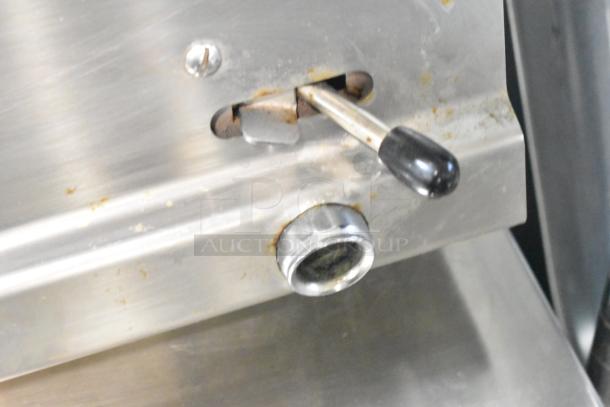 2022 Lotus CPT-66ET electric countertop deep fryer control panel, metal surface with lever. Good condition.