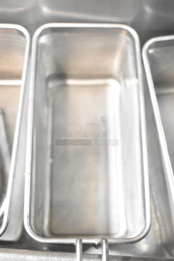 2022 Lotus CPT-66ET commercial electric fryer with multiple fry baskets. Stainless steel, excellent condition. 380-415V.