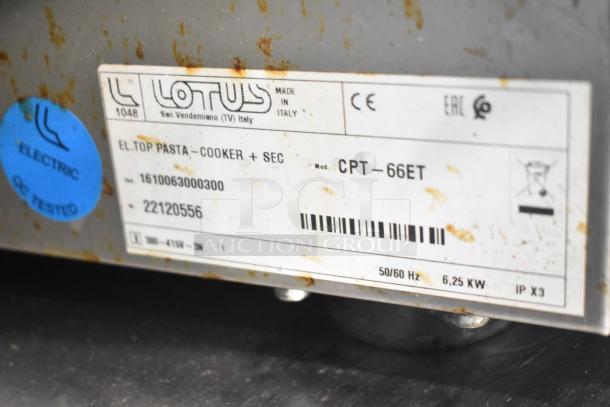 2022 Lotus CPT-66ET commercial electric deep fryer tag showing model, voltage, and certification details. Slight wear visible.