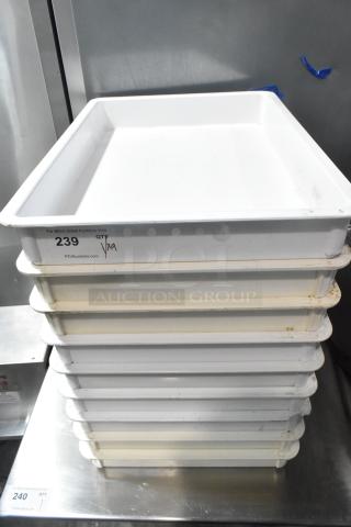 9 white poly dough bins stack, moderately used. Marked as QTY x9, item number 239 at PCIauctions.com. Suitable for kitchen use.