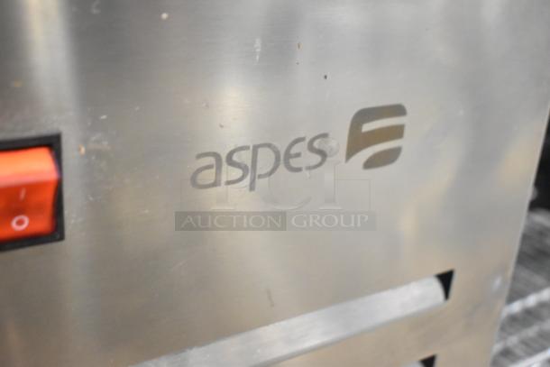 Aspes Commercial 2 Drawer Chef Base, stainless steel, logo visible, shows wear, red power switch, durable kitchen appliance.