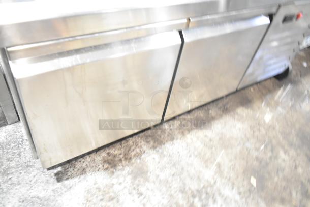 Aspes Commercial 2 Drawer Chef Base, stainless steel, mild surface wear, sturdy, ideal for kitchen storage.