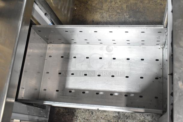 Aspes Commercial 2 Drawer Chef Base, stainless steel, perforated drawer, visible wear, commercial-grade durability.