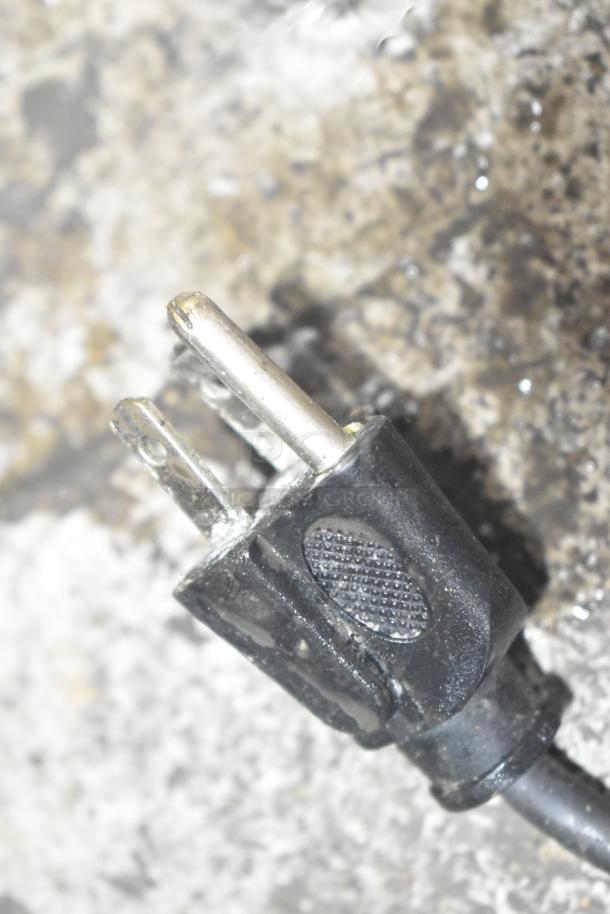 Alt text: Close-up of a black electrical plug from the AyrKing BBS-U Commercial Breader/Blender/Sifter Table.