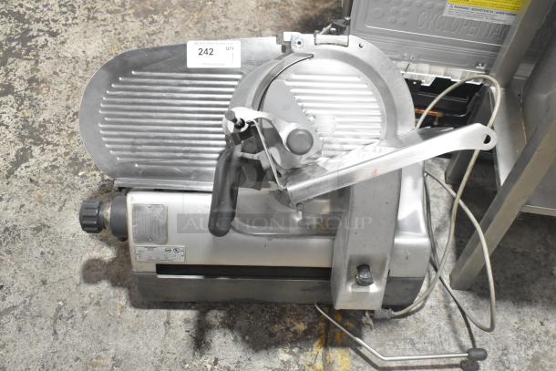 Hobart 2912 commercial countertop automatic meat slicer, 115 volts, 1 phase, stainless steel, good condition, item tag 242.