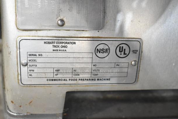 Hobart 2912 Automatic Meat Slicer with 115 Volts, 1 Phase. Features label with serial number and NSF, UL certifications.