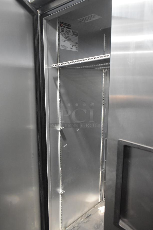 2018 True T-35-HC Reach-In Cooler, 2-door, on commercial casters, 115 volts, interior view, label visible.