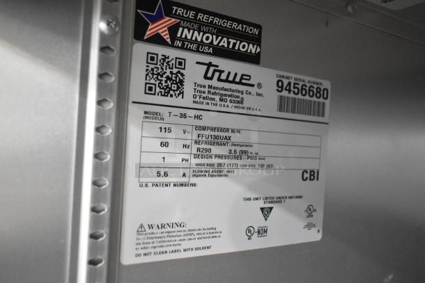 Label on 2018 True T-35-HC commercial cooler, showing model, voltage, phase, refrigerant, and design pressure details.