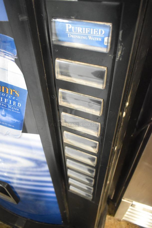 Royal RVCDE-768-10 vending machine, 115 volts, 1 phase, displays product slots with one labeled "Purified Drinking Water."