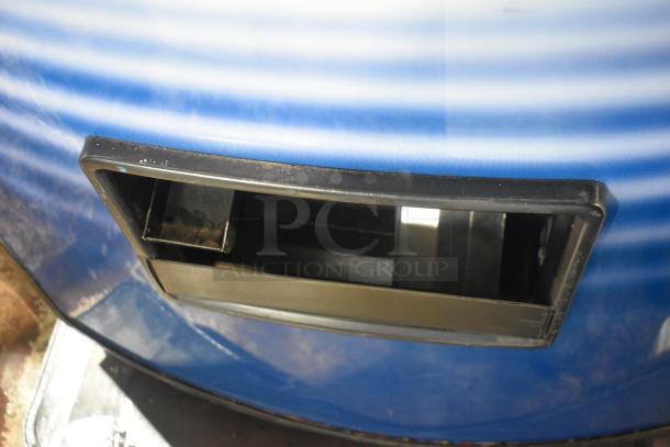 Royal RVCDE-768-10 vending machine, blue exterior, coin slot visible. 115 volts, 1 phase. Commercial use.